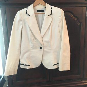 DANA BUCKMAN White Blazer with Black trim.